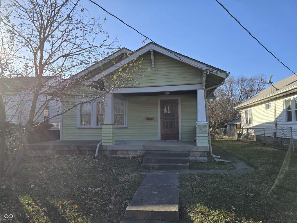 Great covered porch and an open area as well if you want to soak up the sun... at 364 S Ritter Avenue, Indianapolis, IN 46219