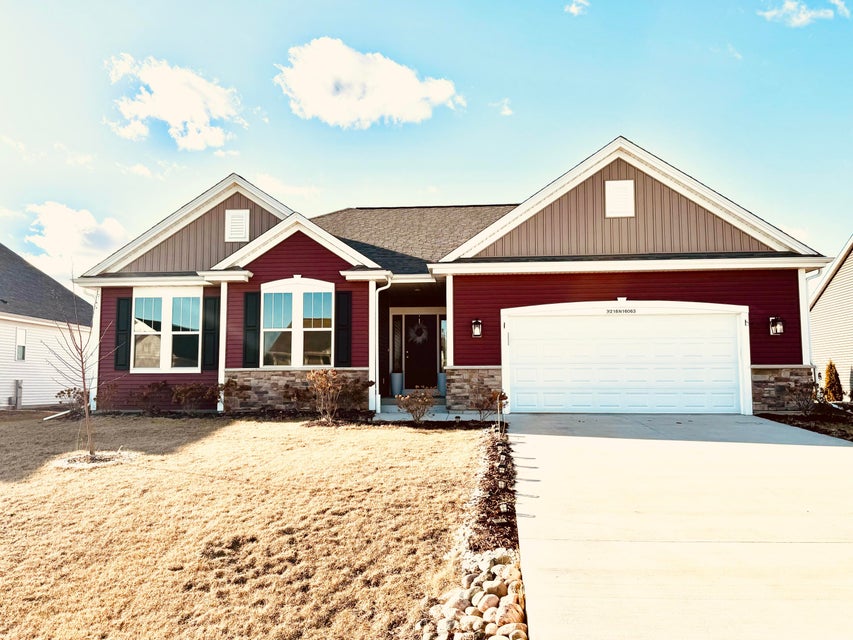 Front at W218N16063 Tiger Lily Dr, Jackson, WI 53037