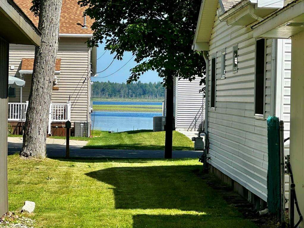 130 Wood Avenue, East Tawas, MI 48730 MLS 58050145840 properties