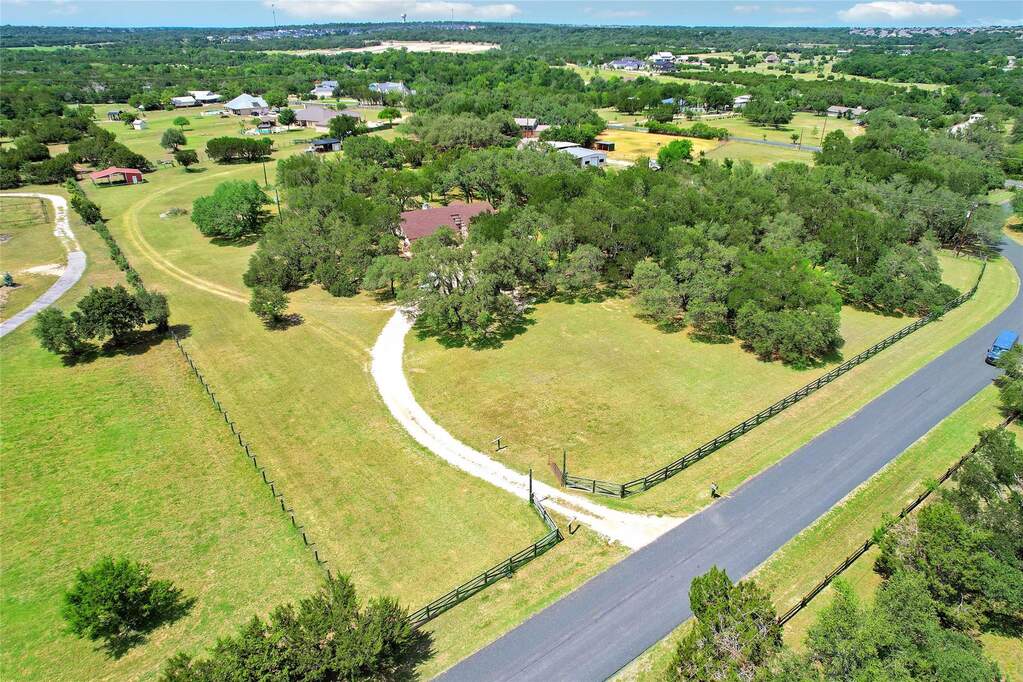 Tucked away on 5 acres in a peaceful equestrian community in Leander, this single-story 3 BD, 3 BA home offers a rare blend of privacy, freedom, and natural beauty—without the hassle of an HOA.  at 4 Valley View Cir, Leander, TX 78641